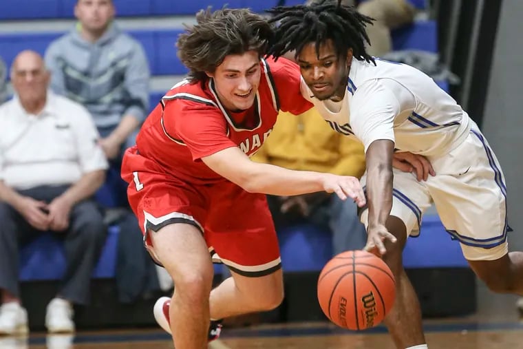 Paul VI's Jalen Boyd-Savage (right) tries for the loose ball with Lenape's Anthony Cashmer.