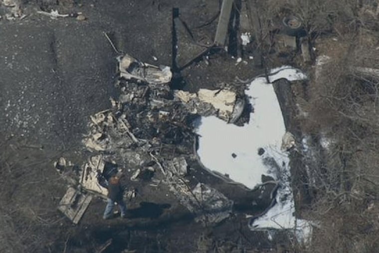 Aerial shot of the crash site just west of 202 where the small plane went down.