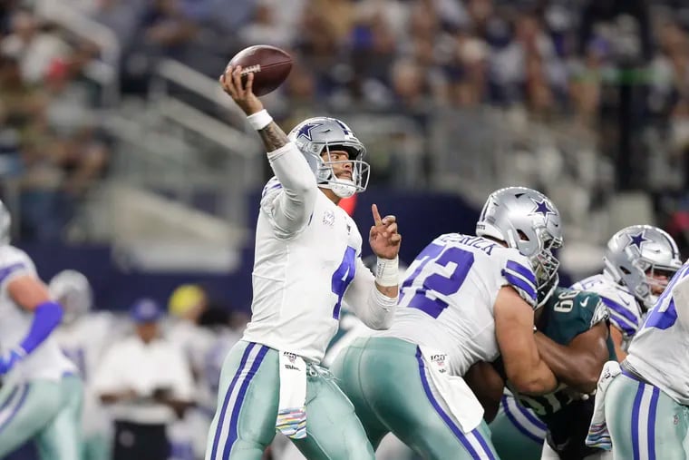 Dallas Cowboys quarterback Dak Prescott throws the football against the Eagles in October.