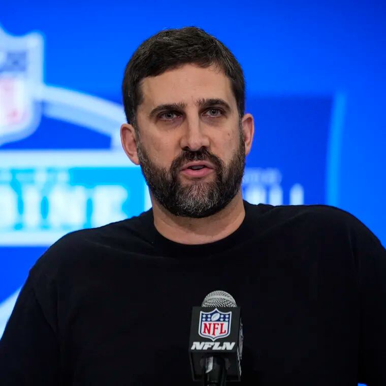 Eagles head coach Nick Sirianni peaks during a press conference at the NFL football scouting combine in Indianapolis, Tuesday, Feb. 27, 2024. (AP Photo/Michael Conroy)