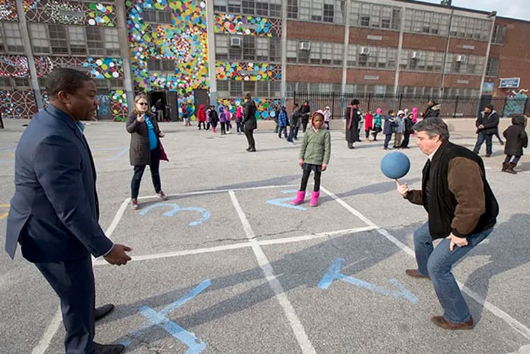 Councilman Bobby Henon plays four square with Rodney Oglesby, Jeanette Fournier and third-grader Eniyah Tillman at McMichael Elementary School in West Philadelphia on Friday, January 16, 2015. ( DAVID SWANSON / Staff Photographer )