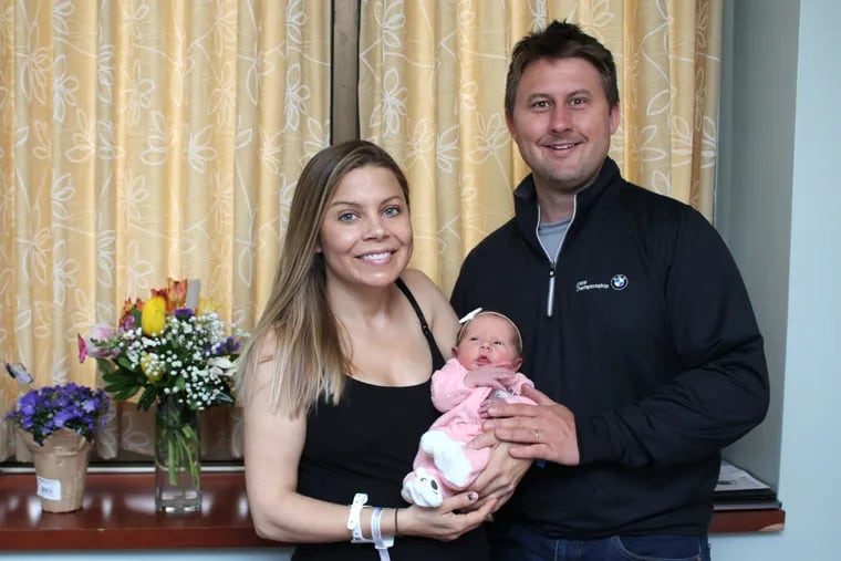 Lara Pyle and Jason Craparo with baby Audrey Claire, named after the restaurant and studio kitchen.
