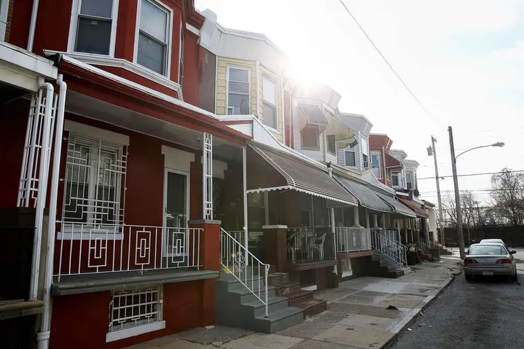 Rowhouses are pictured along the 3100 block of Pennock Street in North Philadelphia. A new program through the Pennsylvania Housing Finance Agency and the collaborative Philly5000 is giving first-time Philadelphia home buyers access to grants, forgivable loans, and favorable mortgages so they can afford to purchase homes.