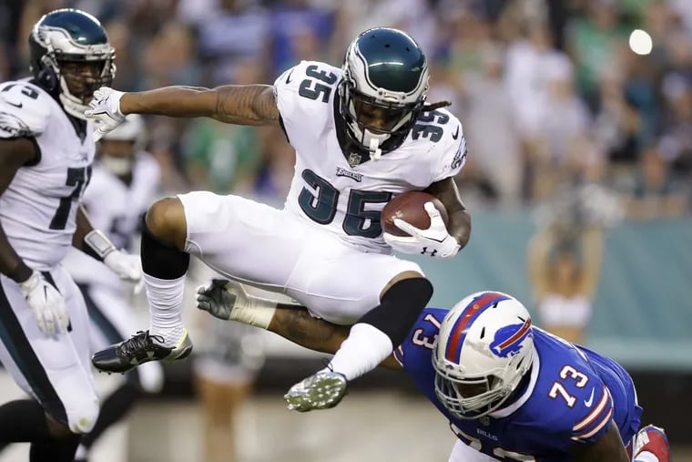 New Eagles cornerback Ronald Darby hurdles Bills tackle and former Temple Owl Dion Dawkins during the first-quarter of the Eagles 20-16 preseason win over the Bills on Thursday.