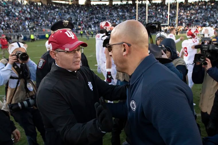 Indiana head coach Tom Allen, left, greets Penn State head coach James Franklin following their game on  Nov. 16. Penn State won, 34-27.