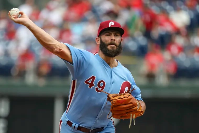 Jake Arrieta unleashes a pitch in the first inning Thursday against the San Francisco Giants at Citizens Bank Park.