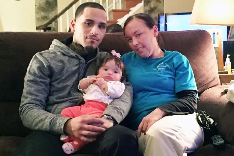 Najee Rivera with his then-girlfriend and their daughter. He was shot at C and Somerset Sts. In 2013, Rivera was beaten by police and accused of assaulting an officer. Video told a different tale.