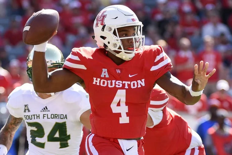 Houston quarterback D'Eriq King (4) looks to pass during the first half of an NCAA college football game against South Florida, Saturday, Oct. 27, 2018, in Houston. (AP Photo/Eric Christian Smith)