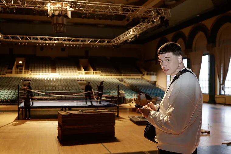 South Jersey boxer Thomas LaManna checks on how the set up is going for his boxing event in the Adrian Phillips Theater at Boardwalk Hall in Atlantic City, N.J. on March 23, 2022. LaManna doubles as a fighter and a promoter and hopes to bring boxing back to prominence in Atlantic City.