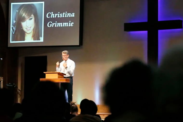 AtFellowship Alliance Chapel in Medford, Bryan Russell says a prayer for Grimmie, who was a church member.