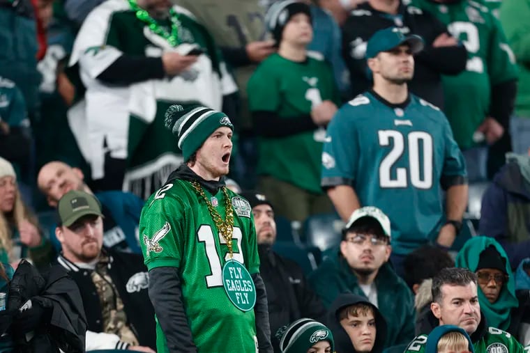 An Eagles fan yawns late in the fourth quarter against the San Francisco 49ers on Sunday, December 3, 2023 in Philadelphia.