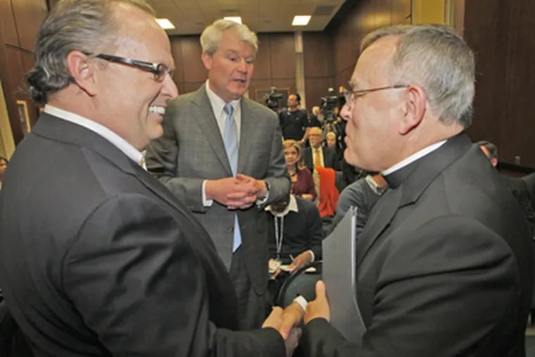 Brian O’Neill (left), chairman of O’Neill Properties, greets Archbishop Charles J. Chaput at Center City news conference Feb. 24 at which Chaput announced that all four Philadelphia Archdiocese high schools targeted by a blue-ribbon commission for closure would stay open. At center is John J. Dougherty, business manager of IBEW Local 98. (ALEJANDRO A. ALVAREZ / STAFF PHOTOGRAPHER)