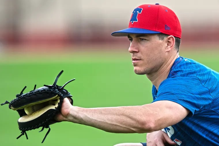 J.T. Realmuto didn't choose the Phillies, but now that he's with them, he wouldn't mind having Bryce Harper as a teammate.