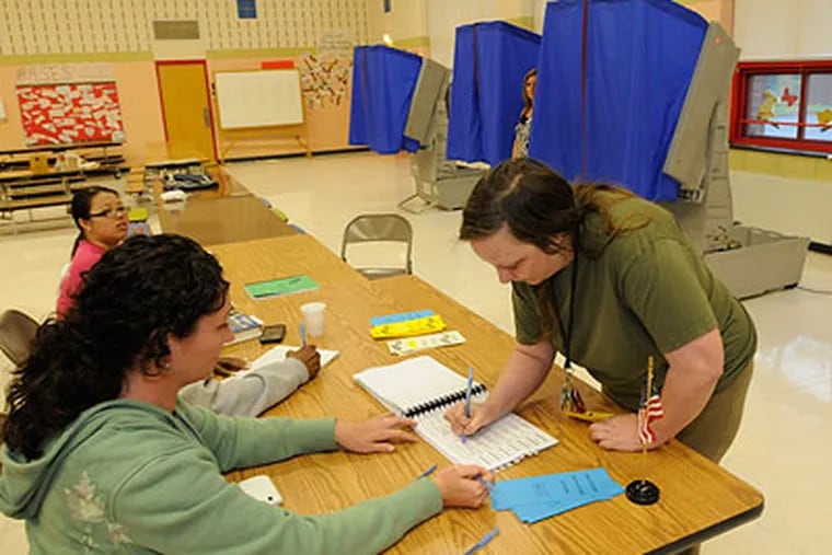 Rosanne Dunn, of Bensalem, was just  the 92nd voter, out of 1,922 registered, to cast ballots as of 1 pm. at Cornwells Elementary School in Bucks County's lower middle third. (Ron Tarver / Staff Photographer)