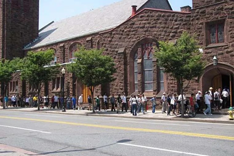 People line up outside the Presbyterian Church on Pennsylvania and Pacific Avenues, where Sister Jean’s Kitchen operates.