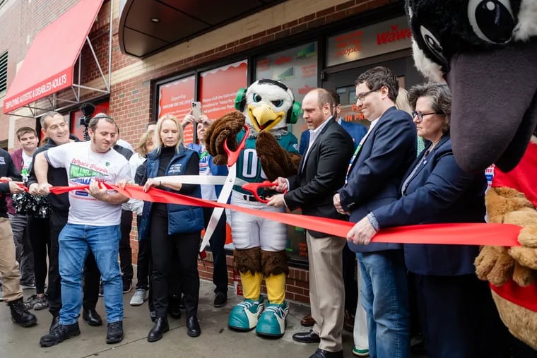 Eagles mascot Swoop was on hand to help cut the ribbon on a new popcorn production facility at Ninth and South Streets in Philadelphia, Pa., on Wednesday, Feb. 28, 2024. The Eagles Autism Foundation partnered with Wawa, nonprofit Popcorn for the People, and the Nouryon company to create new jobs for the neurodiverse community.