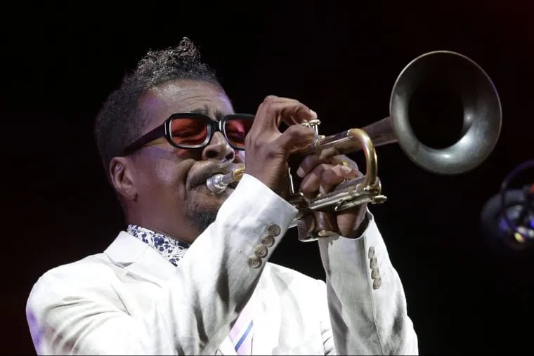 In this July 26, 2018 photo, American jazz trumpeter Roy Hargrove performs at the Five Continents Jazz festival, in Marseille, southern France. The Grammy-winning jazz trumpeter has died at age 49. Manager Larry Clothier says in a statement that Hargrove died in New York on Friday, Nov. 2, from cardiac arrest stemming from a longtime fight with kidney disease. (AP Photo/Claude Paris)