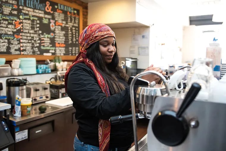 Yazmeen Washington, 21, pulls an espresso at The Monkey and the Elephant, a non-profit coffee shop that seeks to equip those recently aged out of foster care with the tools necessary for adulthood.