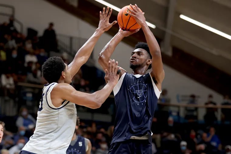 Trey Patterson, right, shoots over Jermaine Samuels during Villanova's Blue-White Scrimmage.