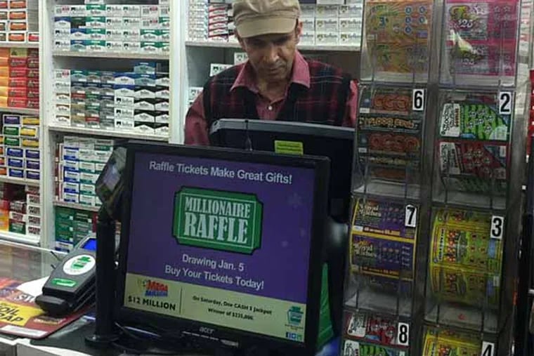 Ashok Kaul of Levittown News & Tobacco tried to figure out which customer bought the ticket before Roger Custer eventually showed up to claim his winnings.
