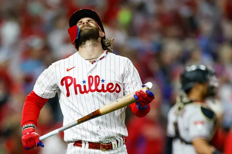 Phillies first baseman Bryce Harper reacts after hitting a long fly ball during Game 7 of the NL Championship Series against the Diamondbacks.