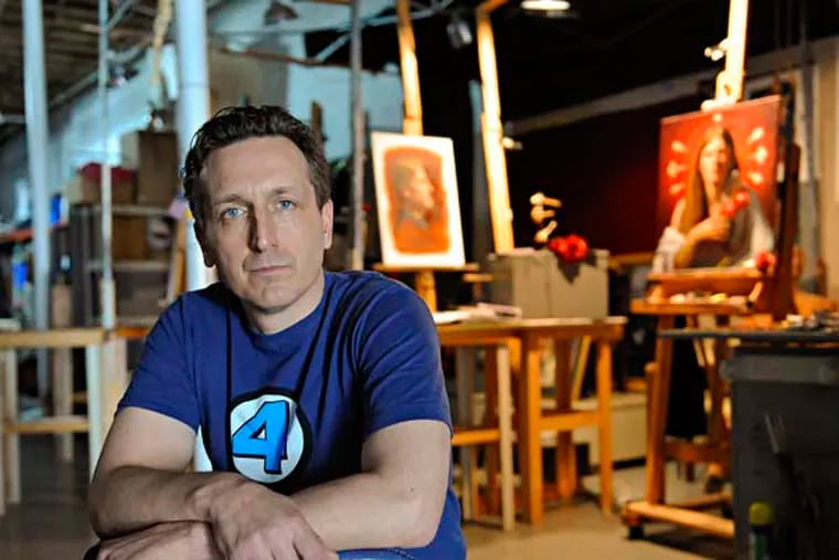 Artist Neilson Carlin sits in his studio in Kennett Square, PA, May 13, 2015. Carlin was commissioned to paint the Holy Family to promote the upcoming World Meeting of Families. (Jonathan Wilson / For the Inquirer)