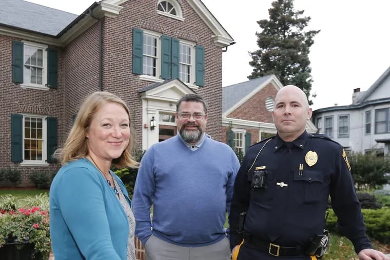 City of Woodbury Mayor Jessica M. Floyd, city administrator Scott Carew and Woodbury Police Chief Thomas Ryan at Woodbury City Hall on Oct. 12.  The three and others in city government and in the community are working to make Woodbury more LGBTQ-friendly.