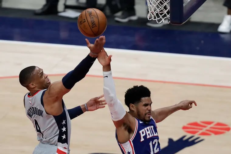 Sixers forward Tobias Harris (right) fouls Wizards guard Russell Westbrook in the third quarter Monday.