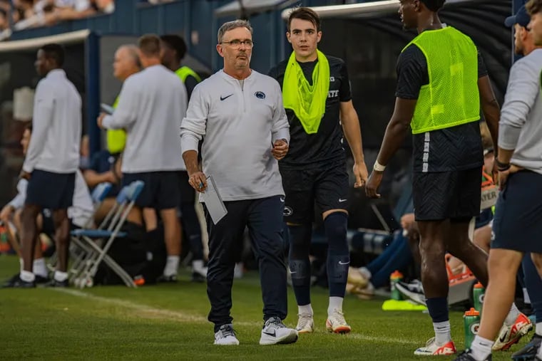 Penn State men's soccer coach Jeff Cook, center, has had many stops, but his time with the Union's youth academy created a pipeline of talent to State College.