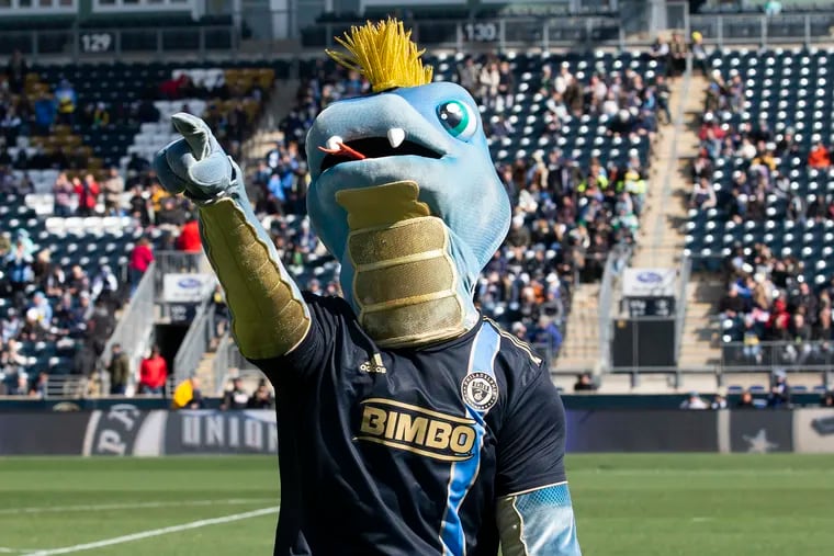Phang, mascot of the Philadelphia Union, points to members of the crowd before their game against the Minnesota United FC at Subaru Park in Chester.