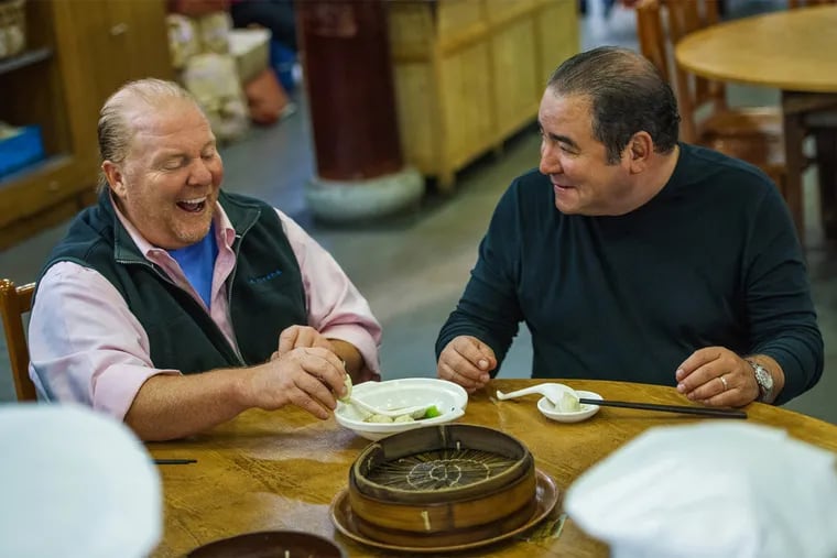 Celebrity chefs Mario Batali, left, and Emeril Lagasse on “Eat the World.”