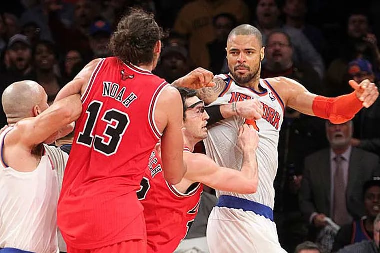 New York Knicks' Jason Kidd (left) and Chicago Bulls' Kirk Hinrich (second from right) separate Bulls' Joakim Noah (13) and Knicks' Tyson Chandler (right) during the second half of an NBA basketball game on Friday, Dec. 21, 2012, at Madison Square Garden in New York. (Mary Altaffer/AP)