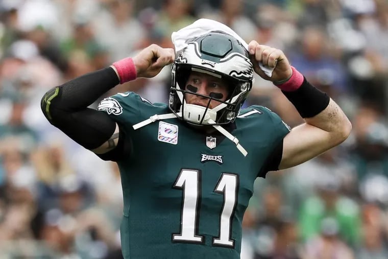 Eagles quarterback Carson Wentz reacts after throwing a incomplete pass against the Arizona Cardinals on Sunday, October 8, 2017 in Philadelphia. YONG KIM / Staff Photographer