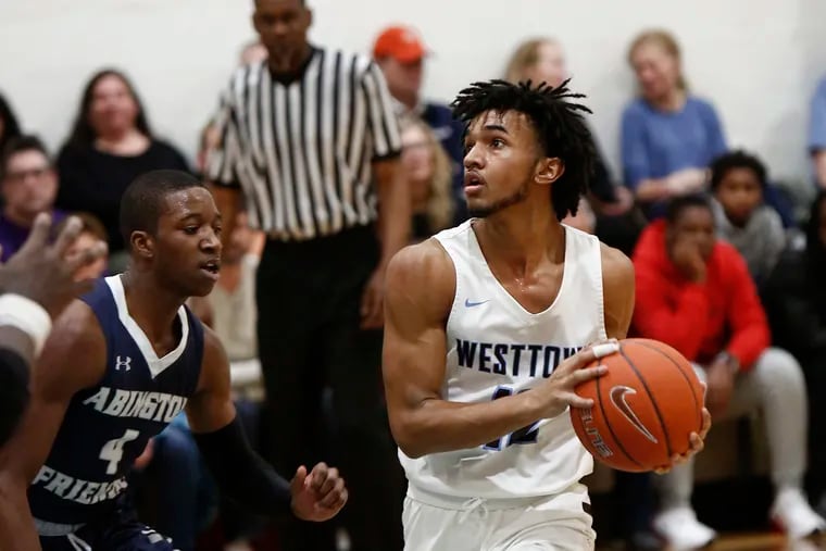 Westtown guard Jalen Gaffney drives past Abington Friends guard Taalib Holloman during the second quarter of a PAISAA first-round basketball game Friday, Feb. 15, 2019, at Westtown. The host Moose went on to win, 61-44. LOU RABITO / Staff