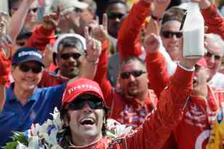 Dario Franchitti celebrates his second Indy 500 win in four years. Franchitti was just about riding on fumes on the last lap.