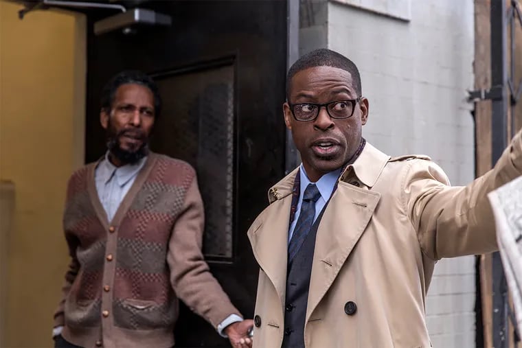 Ron Cephas Jones, left, and Sterling K. Brown in a scene from “This Is Us.”