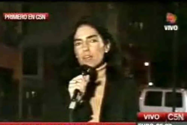 Maria Belen Chapur in the only public image of her so far - from a 2001 video as a TV reporter in New York. She said a hacker revealed her e-mail correspondence with Sanford.