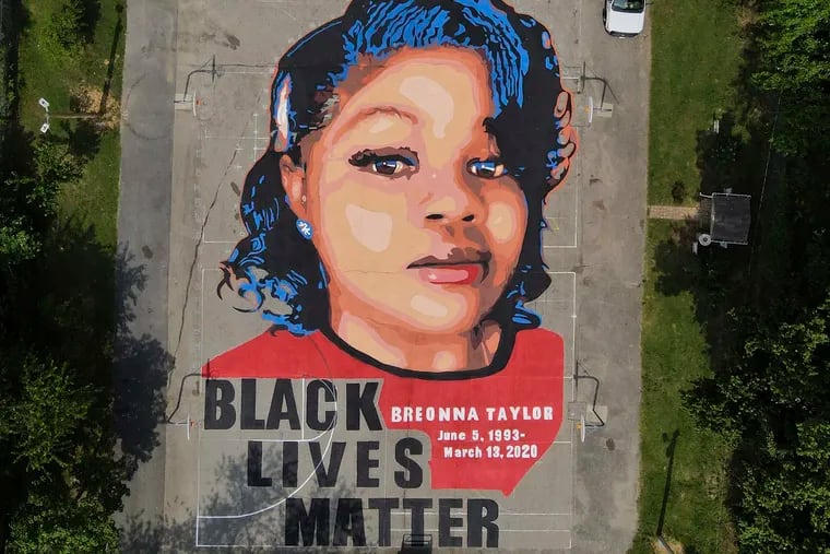 In this aerial view, a mural depicting Breonna Taylor covers the surface of a basketball court at Chambers Park in Annapolis, Md. in July 2020. Taylor, a 26-year old Black woman, was fatally shot in March 2020 by police who were executing a warrant at her Louisville, Ky., apartment.