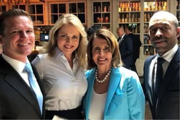 Nancy Pelosi, Minority Leader of the U.S. House, is pictured with Local 98 attorney Jack O'Neill (left), Local 98 political director Marita Crawford (second from left) and consultant Billy Miller (right).