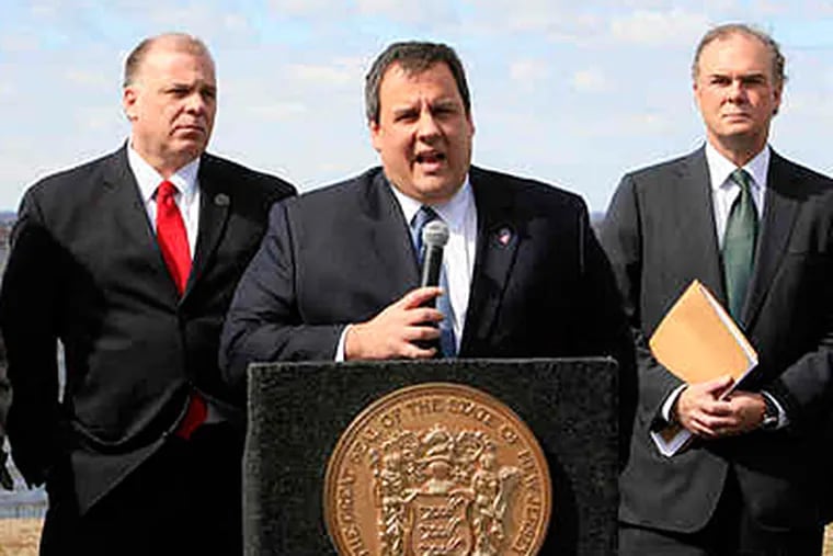 Gov. Chris Christie, (center), who opposes the Delaware River dredging project, addresses a news conference at the Red Bank Battlefield in Gloucester County. With him are New Jersey Senate President Steve Sweeney (left), and Bob Martin, acting commissioner of the New Jersey Department of Environmental Protection. U.S. Rep. Rob Andrews, not pictured, also attended the news conference. (Akira Suwa / Staff)