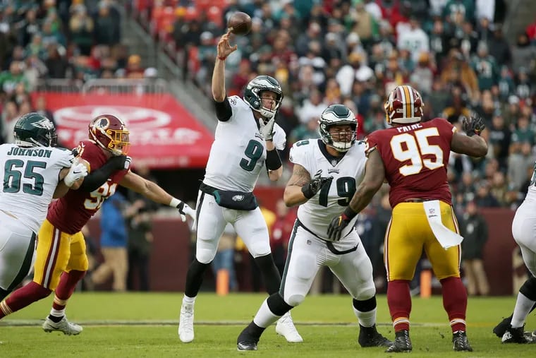 Eagles quarterback Nick Foles (9) throws a pass during a game against the Washington Redskins at FedEx Field in Landover, Md., on Sunday, Dec. 30, 2018.