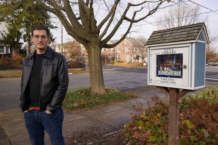 Alex London poses for a photograph at Wolf Park in Mount Airy in Philadelphia on Wednesday. London is a youth author whose books have been targeted to be banned for featuring queer and nonbinary characters.