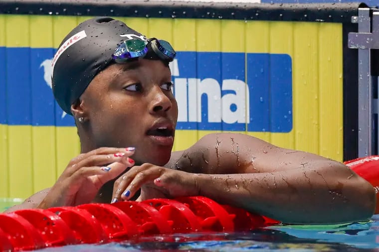Simone Manuel reacts after winning the women's 50-meter freestyle final at the World Swimming Championships in Gwangju, South Korea, in July 2019.