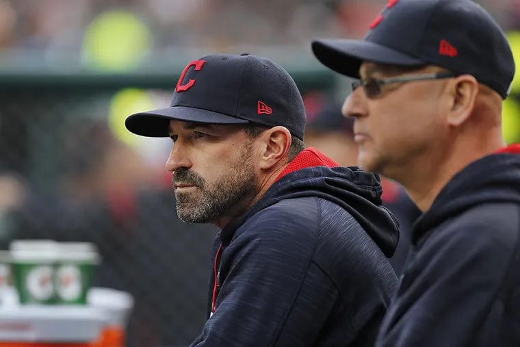Cleveland Indians pitching coach Mickey Callaway watches with manager Terry Francona against the Detroit Tigers in the first inning of a baseball game in Detroit, Wednesday, May 3, 2017.