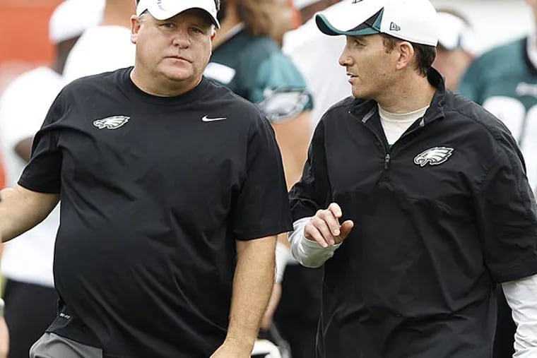 Eagles head coach Chip Kelly (left) and general manager Howie Roseman. (David Maialetti/Staff file photo)