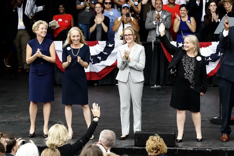 Democrats (from left) Chrissy Houlahan, Mary Gay Scanlon, state Rep. Madeleine Dean and Susan Wild are four of the six Democrats in the Philadelphia region who won U.S. House seats on Election Day and will be new members of Congress in January. They are seen here at a campaign rally in September.