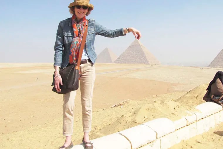 The author Anna Maria DiDio at the Giza Pyramids. Photos are difficult to the enormous scale of the structure.