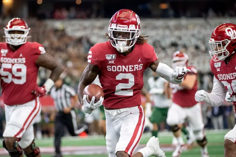 Oklahoma wide receiver CeeDee Lamb runs upfield with a reception against Baylor.