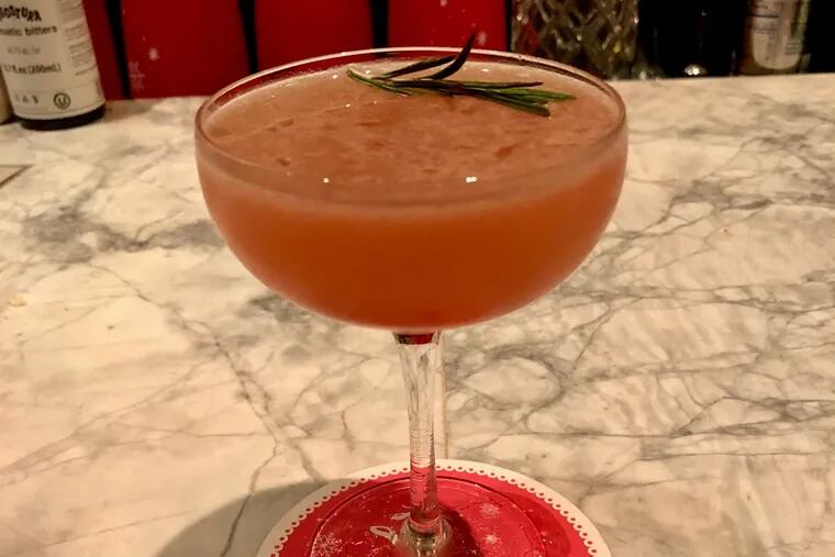 The Chrismapolitan, made of Vodka, Elderflower, Dry Vermouth, Spiced Cranberry Sauce, Rosemary, Lime, Absinthe Mist at In the Valley.