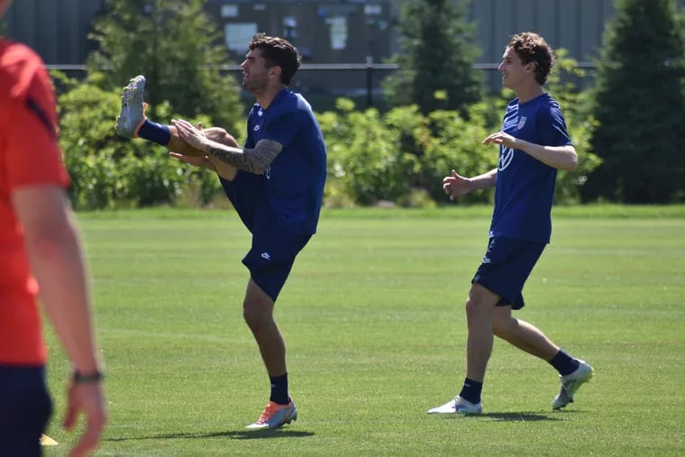 Brenden Aaronson (right) works out with with Hershey's Christian Pulisic at Monday's U.S. men's soccer team practice.